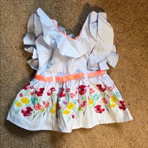 Cute springtime shirt, never been used.